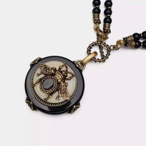 Ebony Bee beaded Necklace, black, Ivory and bronze.